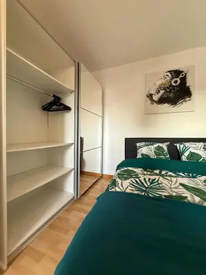 Un ou plusieurs lits dans un hébergement de l'établissement Appartement au cœur du centre à deux pas du casino