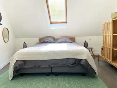 Un ou plusieurs lits dans un hébergement de l'établissement Gîte Moulin des Arts