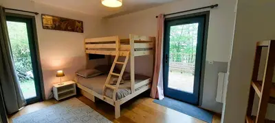 Un ou plusieurs lits dans un hébergement de l'établissement Evasion Nature, Lodge ideal pres du Zoo de Beauval