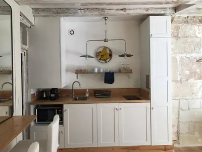 Cuisine ou kitchenette dans l'établissement Bell Art, a deux pas de la cathédrale