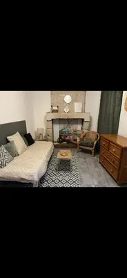 Un ou plusieurs lits dans un hébergement de l'établissement Maison flanc de coteau