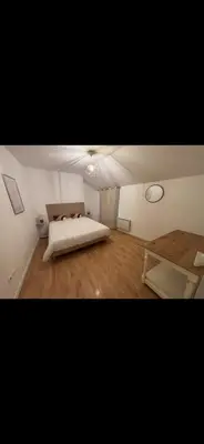 Un ou plusieurs lits dans un hébergement de l'établissement Maison flanc de coteau