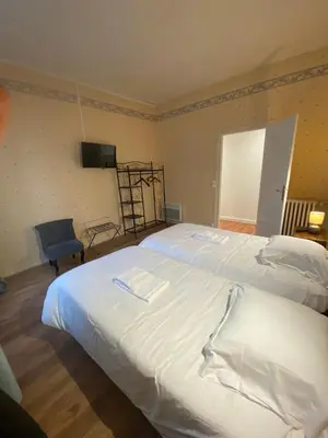 Un ou plusieurs lits dans un hébergement de l'établissement Logement Spacieux 3 Chambres à Azay-le-Rideau