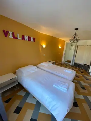 Un ou plusieurs lits dans un hébergement de l'établissement Appt 5 personnes - 2 Chambres, terrasse et jardin