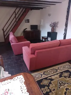Coin salon dans l'établissement Boumelle Gites