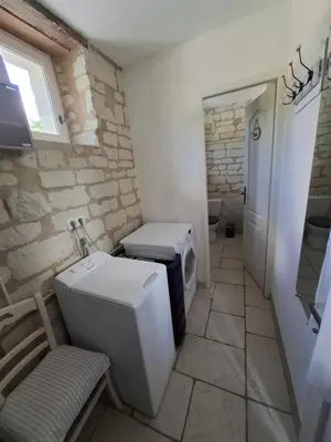 Salle de bains dans l'établissement Gite Les Laurielles