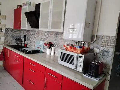 Cuisine ou kitchenette dans l'établissement Maison proche circuit 24H
