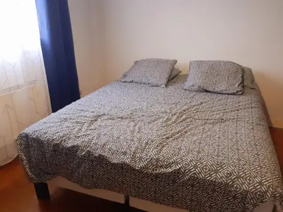 Un ou plusieurs lits dans un hébergement de l'établissement Brossard