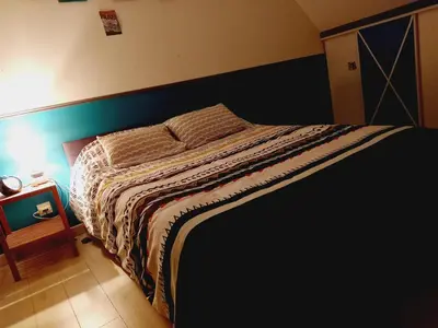 Un ou plusieurs lits dans un hébergement de l'établissement Location 24h du Mans