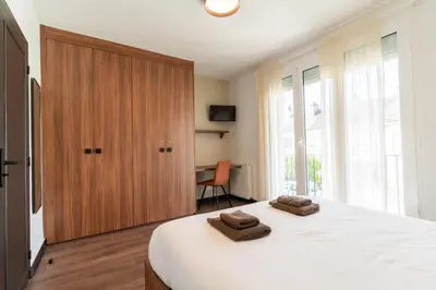 Un ou plusieurs lits dans un hébergement de l'établissement Les Sorbiers & spa