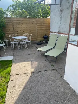Terrasse ou espace extérieur de l'établissement gîte avec sauna