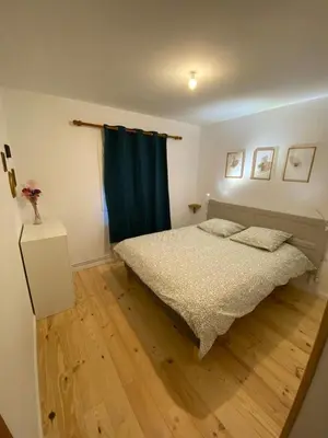 Un ou plusieurs lits dans un hébergement de l'établissement gîte avec sauna