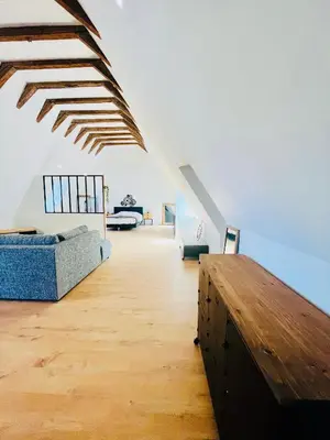 Coin salon dans l'établissement Le Loft - Entre Loire et Chateau Royal - Manoir de la Concorde
