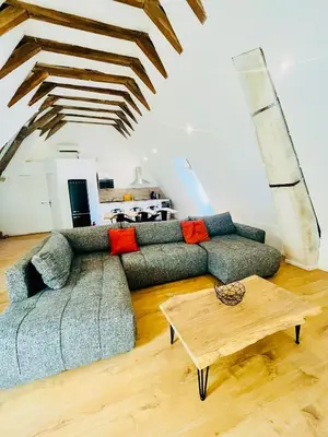 Coin salon dans l'établissement Le Loft - Entre Loire et Chateau Royal - Manoir de la Concorde
