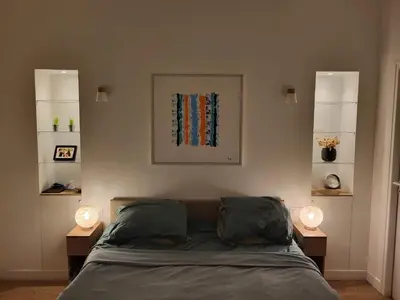 Un ou plusieurs lits dans un hébergement de l'établissement Maison familiale équipée, centre-ville