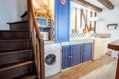 Cuisine ou kitchenette dans l'établissement La Petite Hermine
