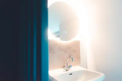 Salle de bains dans l'établissement L'Unique- Maison de famille en Plein Centre-Ville
