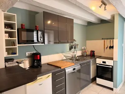 Cuisine ou kitchenette dans l'établissement Clos des Huards au milieu de la loire à vélo
