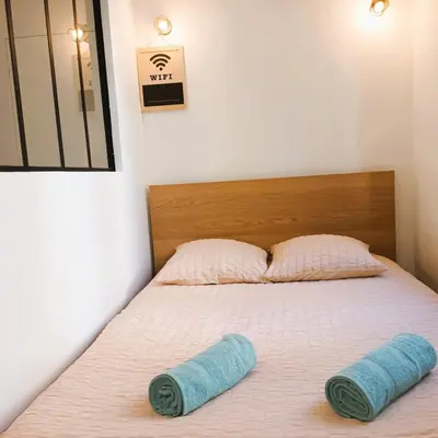 Un ou plusieurs lits dans un hébergement de l'établissement L'Explorateur - Gare - Cozy - Wifi - TV
