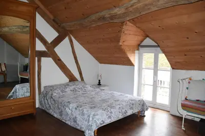 Un ou plusieurs lits dans un hébergement de l'établissement La Maison des Tilleuls