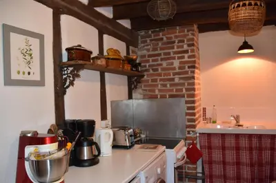 Cuisine ou kitchenette dans l'établissement La Maison des Tilleuls
