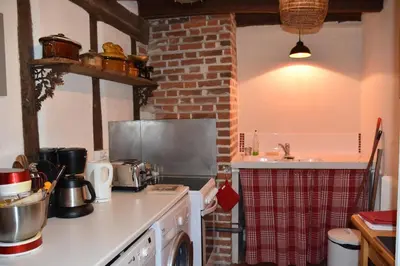 Cuisine ou kitchenette dans l'établissement La Maison des Tilleuls