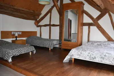 Un ou plusieurs lits dans un hébergement de l'établissement La Maison des Tilleuls