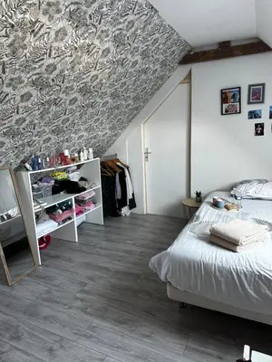 Un ou plusieurs lits dans un hébergement de l'établissement Maison Georget
