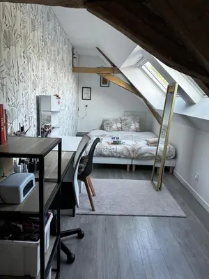 Un ou plusieurs lits dans un hébergement de l'établissement Maison Georget