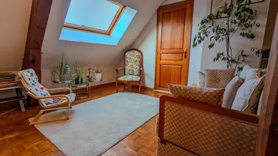 Coin salon dans l'établissement Gîte Le Grand Albizia