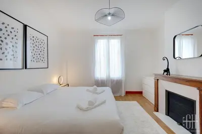 Un ou plusieurs lits dans un hébergement de l'établissement Maison familiale bords de Loire avec jardin et 3 Chambres