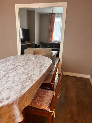 Un ou plusieurs lits dans un hébergement de l'établissement Maison cosy proche gare SNCF 2 chambres