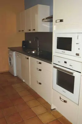 Cuisine ou kitchenette dans l'établissement Le clos des vignes