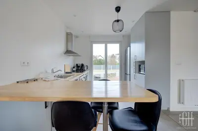 Cuisine ou kitchenette dans l'établissement Maison familiale 4 chambres avec jardin et parking