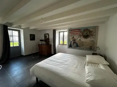 Un ou plusieurs lits dans un hébergement de l'établissement Maison de vacances à Sossais - Campagne calme, 3 chambres, proche sites touristiques - FR-1-541-172