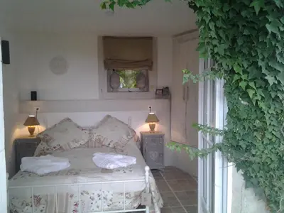 Un ou plusieurs lits dans un hébergement de l'établissement Jasmine cottage