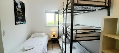 Un ou plusieurs lits dans un hébergement de l'établissement Gîte familial à Azay le Rideau avec Parking
