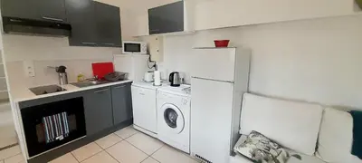 Cuisine ou kitchenette dans l'établissement Gîte familial à Azay le Rideau avec Parking