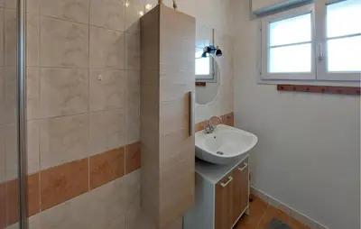 Salle de bains dans l'établissement Gite Proche De Beauval
