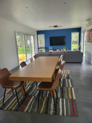 Coin salon dans l'établissement Maison moderne 180 m2, à 10 min du Circuit des 24h du Mans