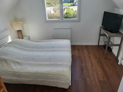 Télévision ou salle de divertissement dans l'établissement Maison moderne 180 m2, à 10 min du Circuit des 24h du Mans