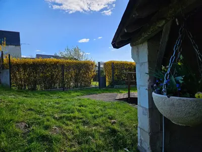 Jardin de l'établissement Au pied du Lavoir chambre Germaine