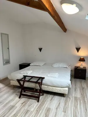 Un ou plusieurs lits dans un hébergement de l'établissement Maison de ville pour groupe, très proche du château de Villandry