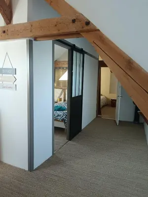 Un ou plusieurs lits dans un hébergement de l'établissement Gîte de l'oeillet