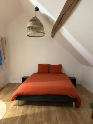 Un ou plusieurs lits dans un hébergement de l'établissement Un studio en Touraine