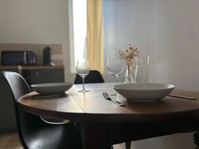 Coin salon dans l'établissement L appartement du château