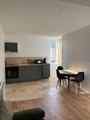 Cuisine ou kitchenette dans l'établissement L appartement du château