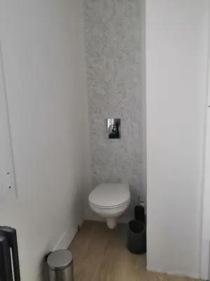Salle de bains dans l'établissement Maison proche centre ville et circuit avec jardin