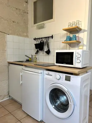 Cuisine ou kitchenette dans l'établissement Terracotta - Quai de la Loire - Cozy