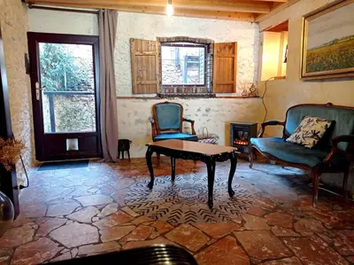 Coin salon dans l'établissement Le Logis du Vieux Rempart